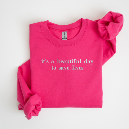 it's a beautiful day to save lives Embroidered Sweatshirt